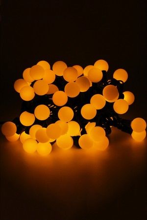Светодиодная гирлянда Мультишарики 25 мм 100 желтых LED ламп 15 м, черный ПВХ, соединяемая, IP44, SNOWHOUSE